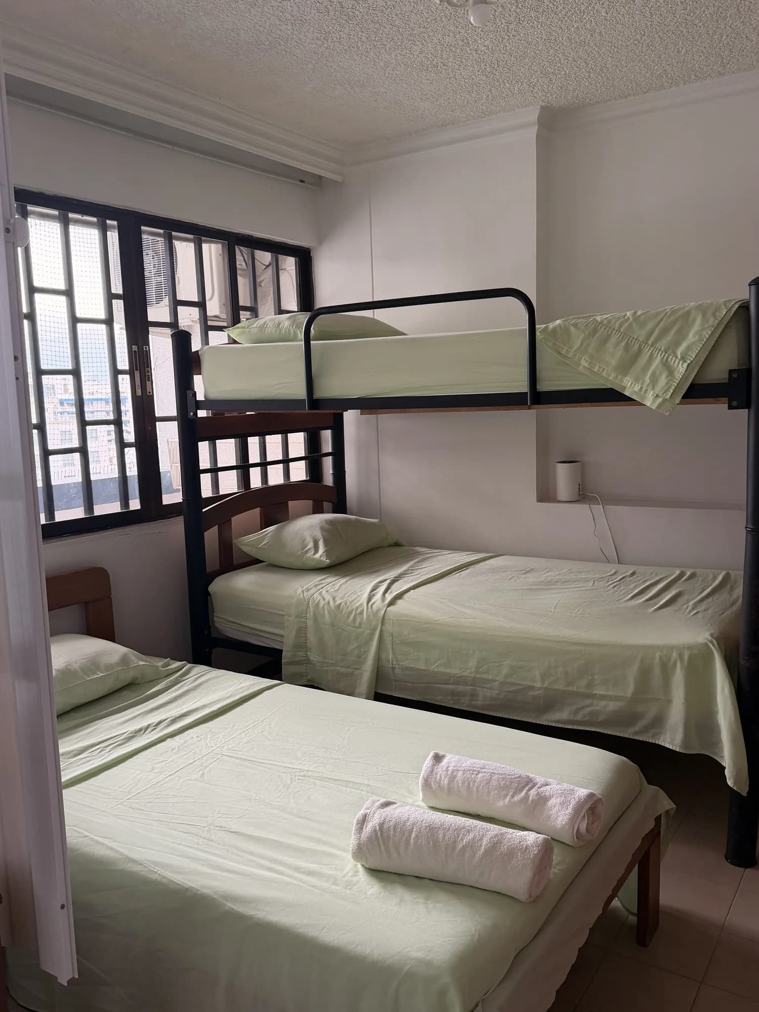 Bedroom with multiple beds