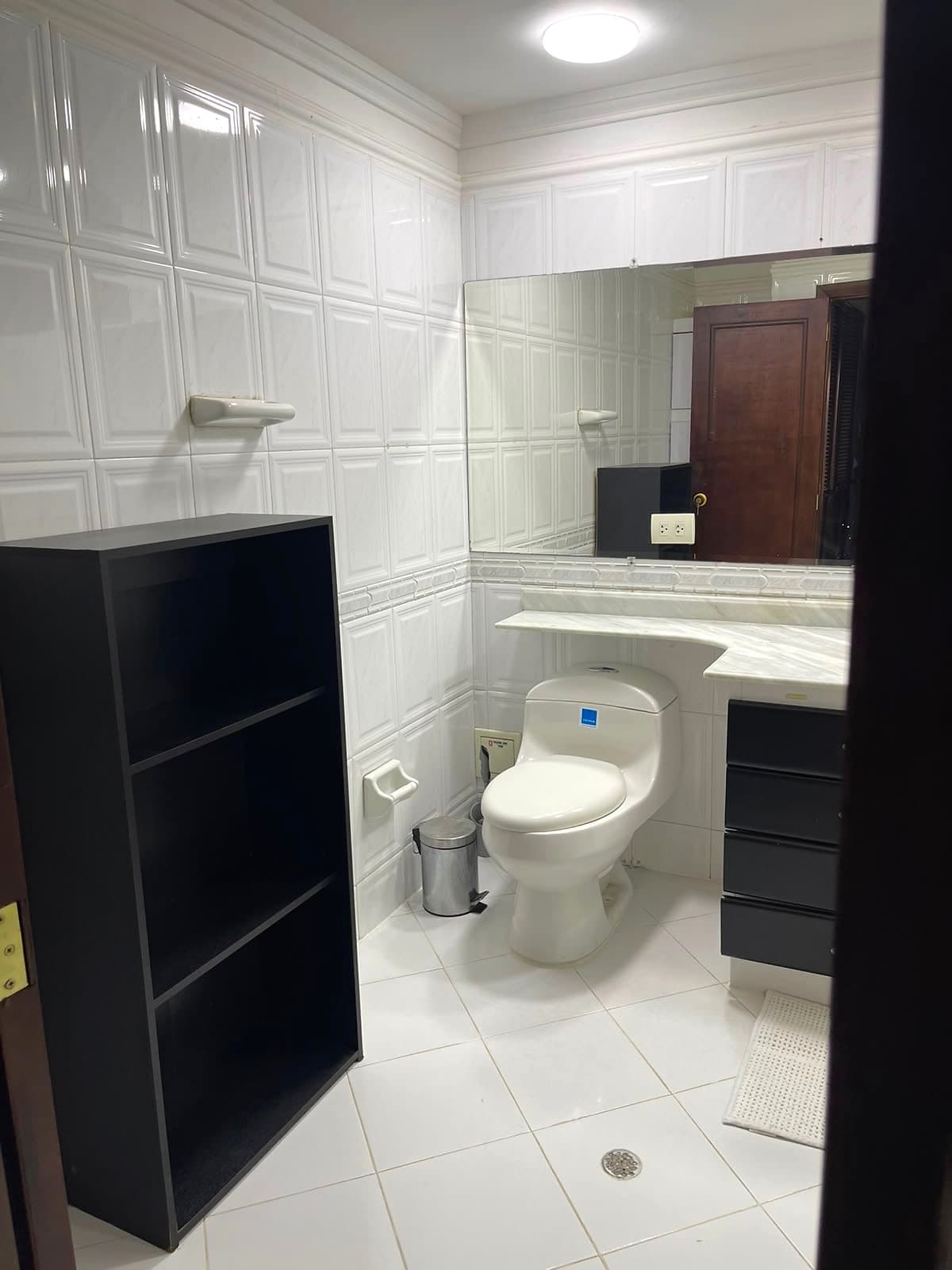 Bathroom with vanity and shower